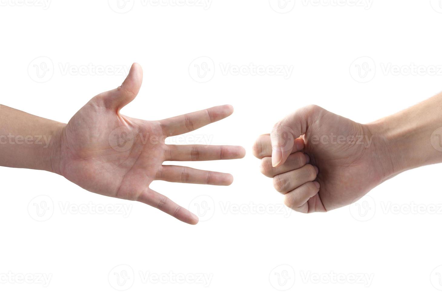 The fighting of two hand with rock and paper symbol photo