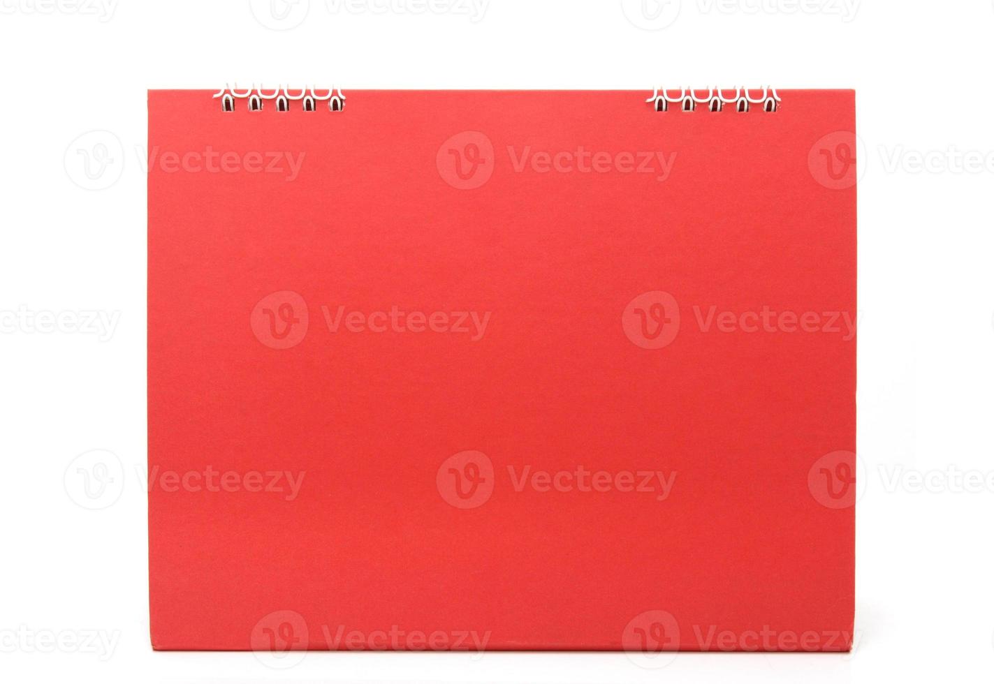 red blank desktop calendar with isolated on white background photo