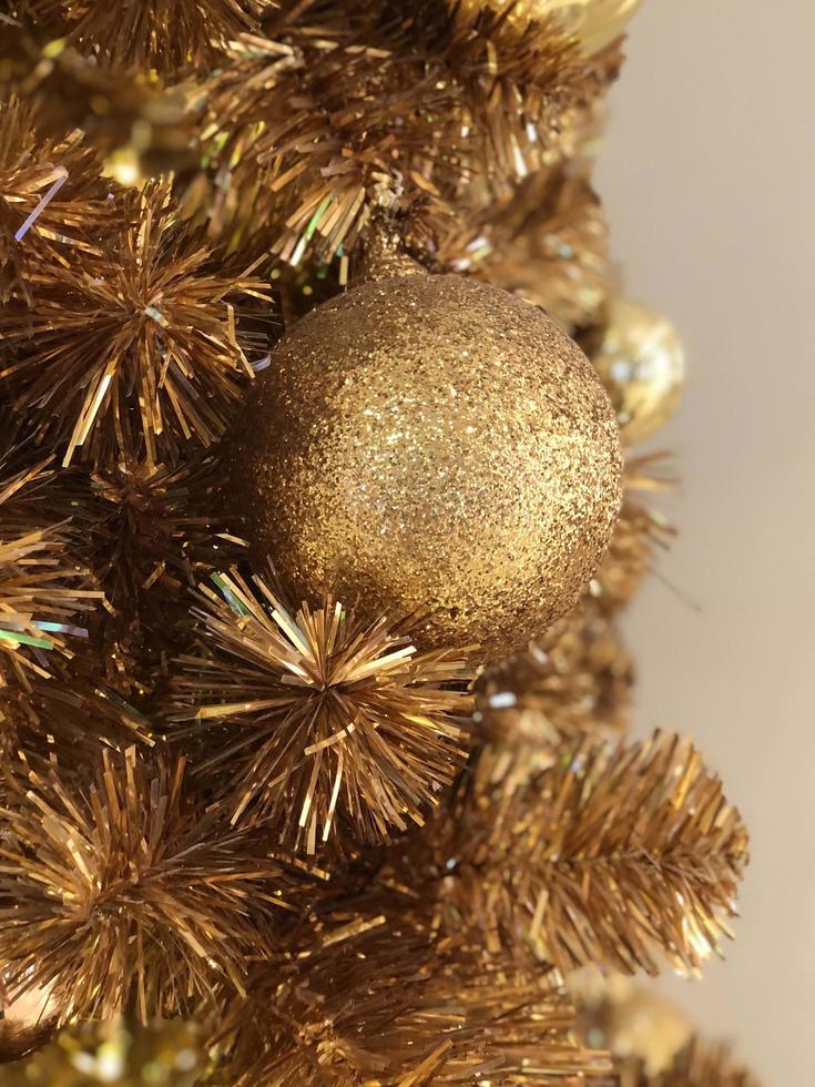 Golden Merry Christmas ball background. Happy new year and merry christmas 2023 photo