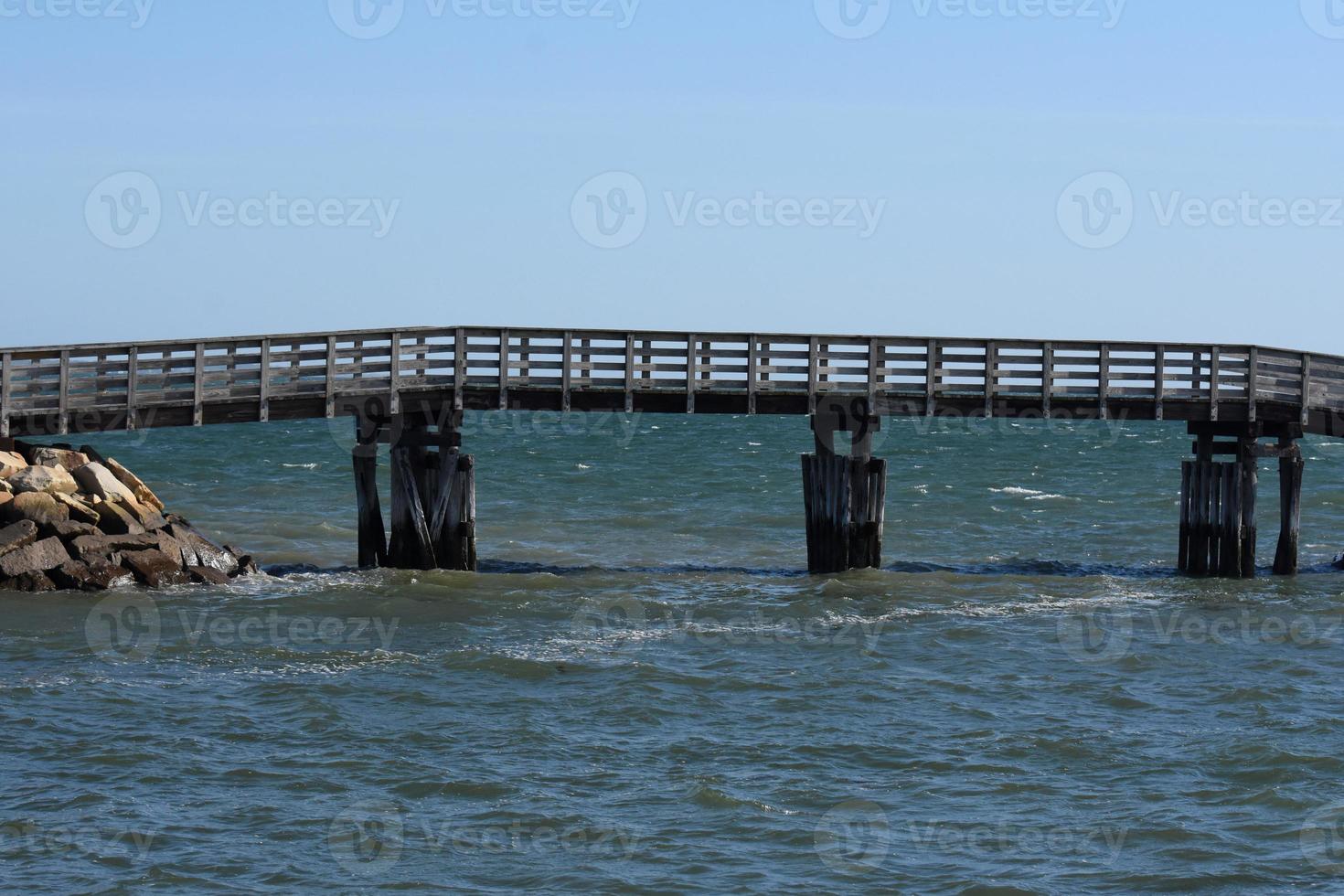 Long Wooden Foot Bridge Over the Atlantic Ocean photo