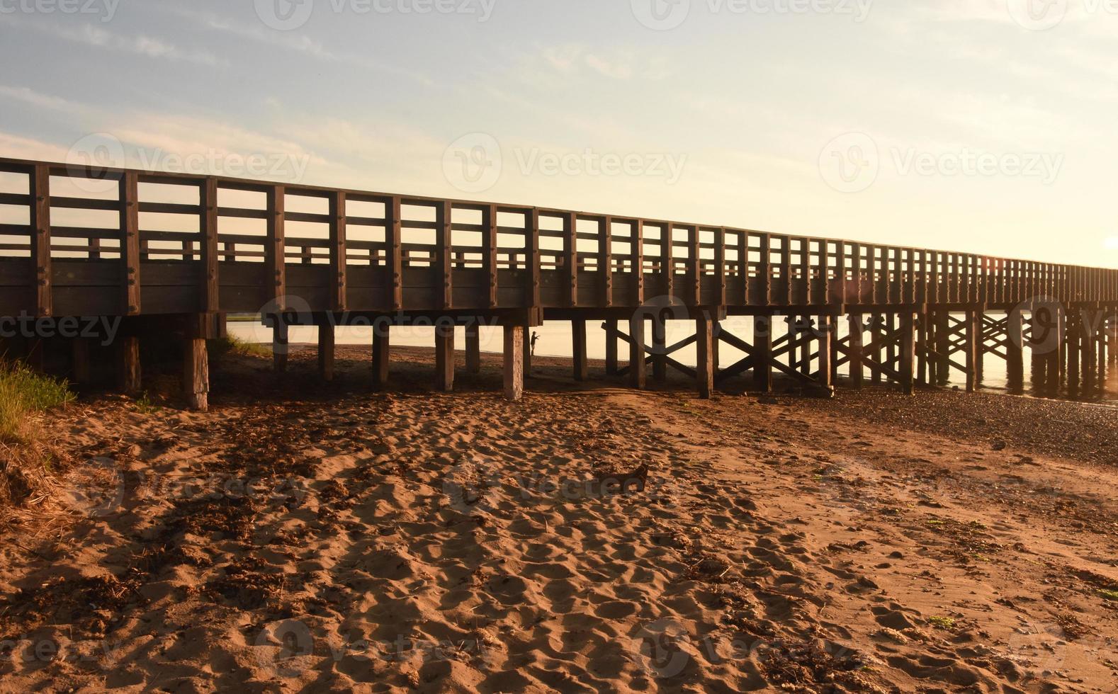 Beach, Bay and Pier Views of Wooden Pier photo