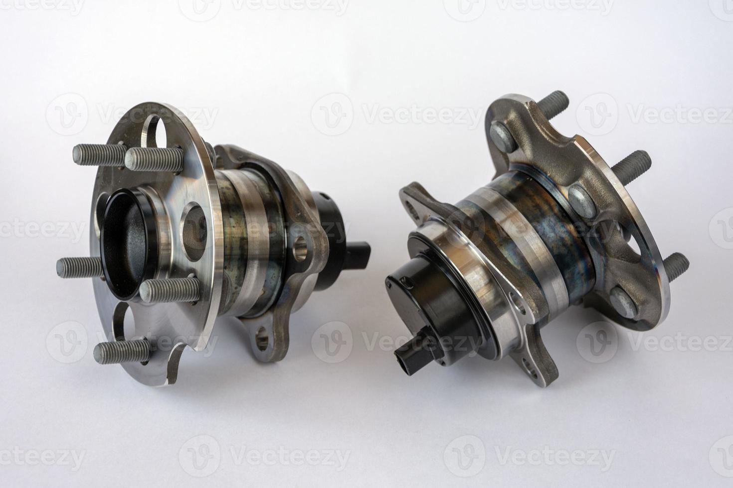 A pair of rear wheel hubs with ABS sensor, isolated on a white background, hub bearing photo