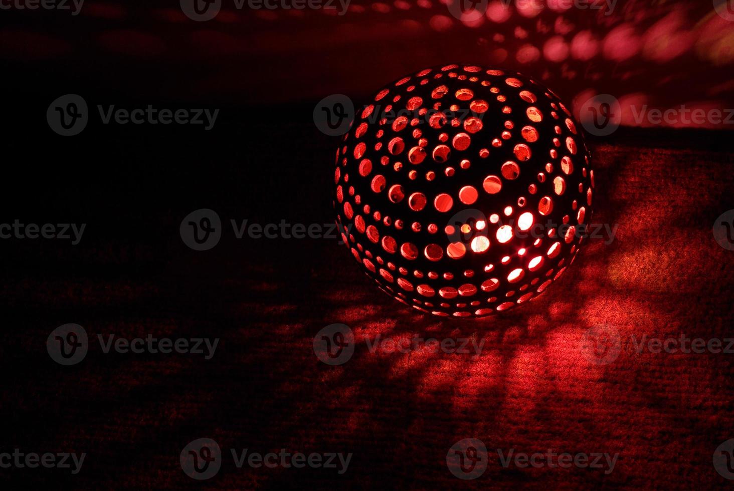 Red light inside a DIY coconut shell lamp photo