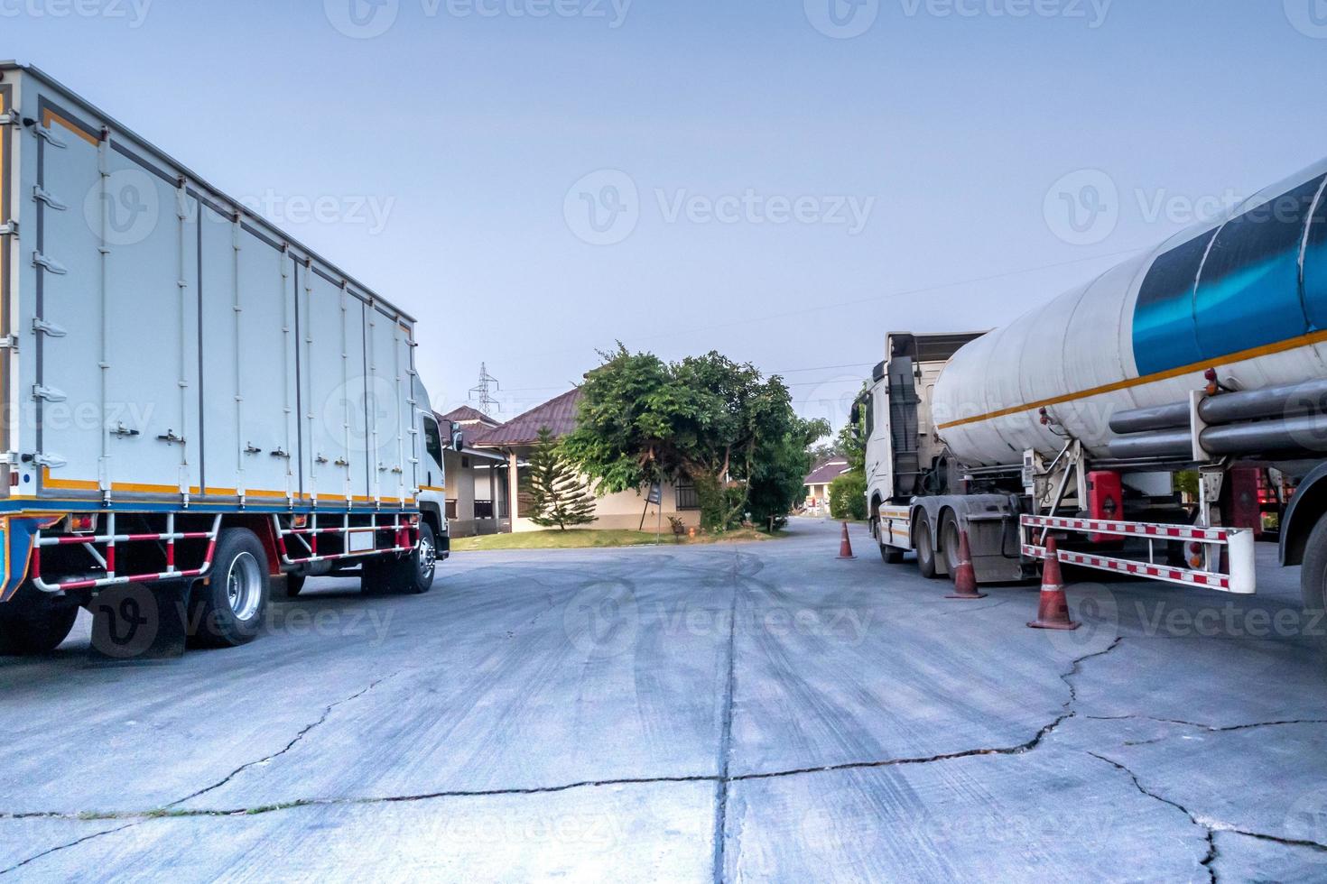 Rear view of Container truck and Tanker truck vehicle photo