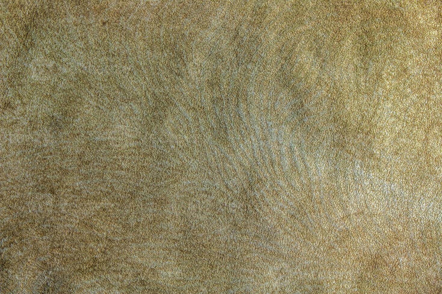 Leather background. Beige texture of leather, brown suede. photo