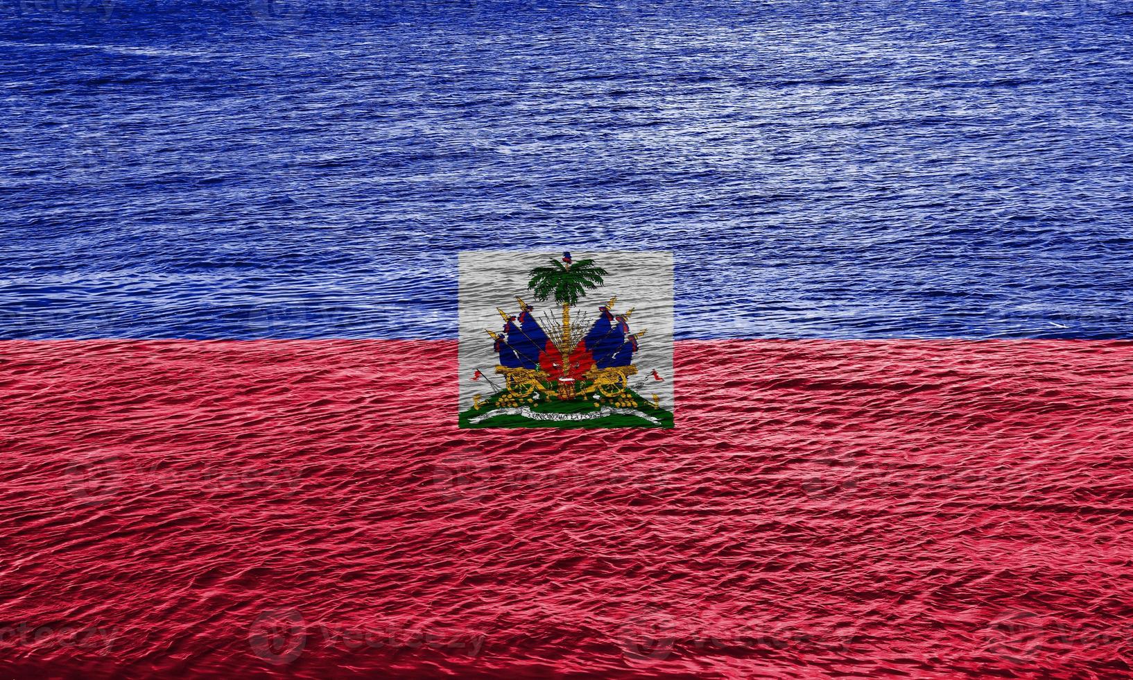 Flag of the Republic of Haiti On the texture of the surface of the water with small ripples. photo