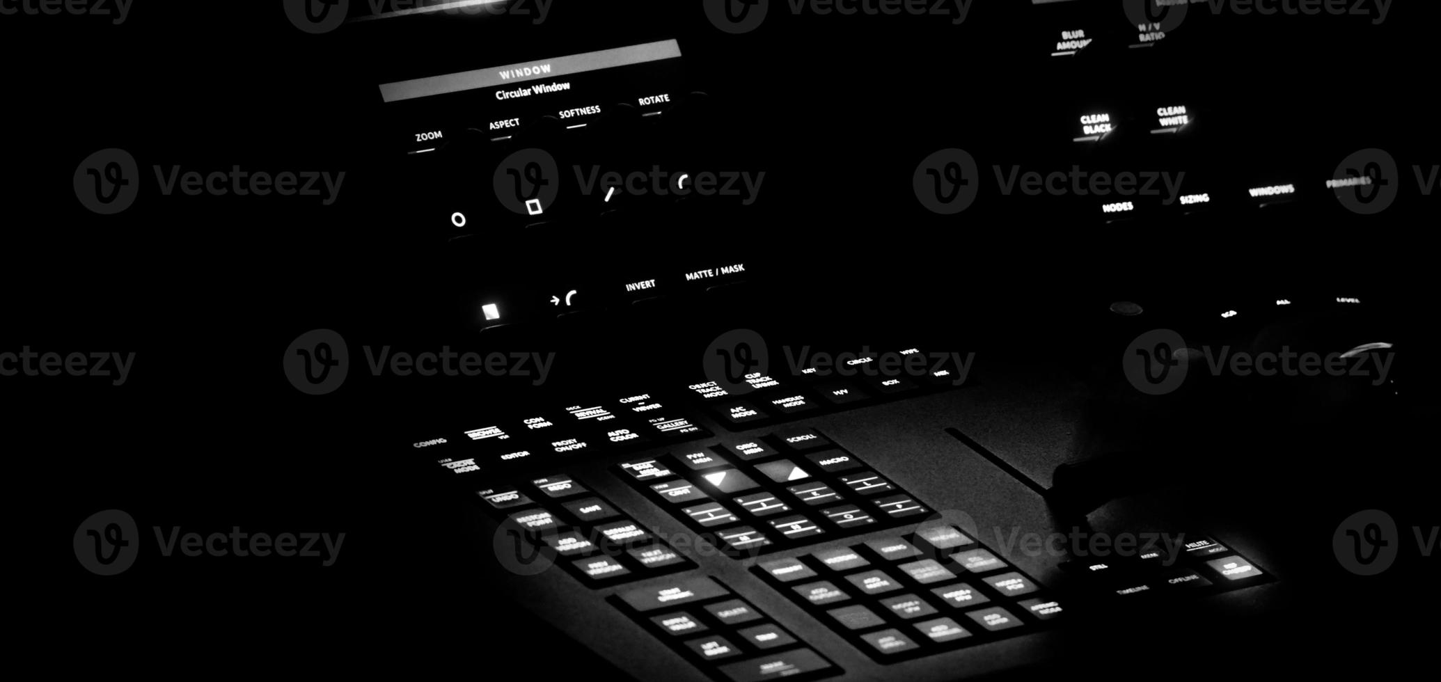 Edit video production control panel in studio. Editor editing and grade film in movie post room. photo