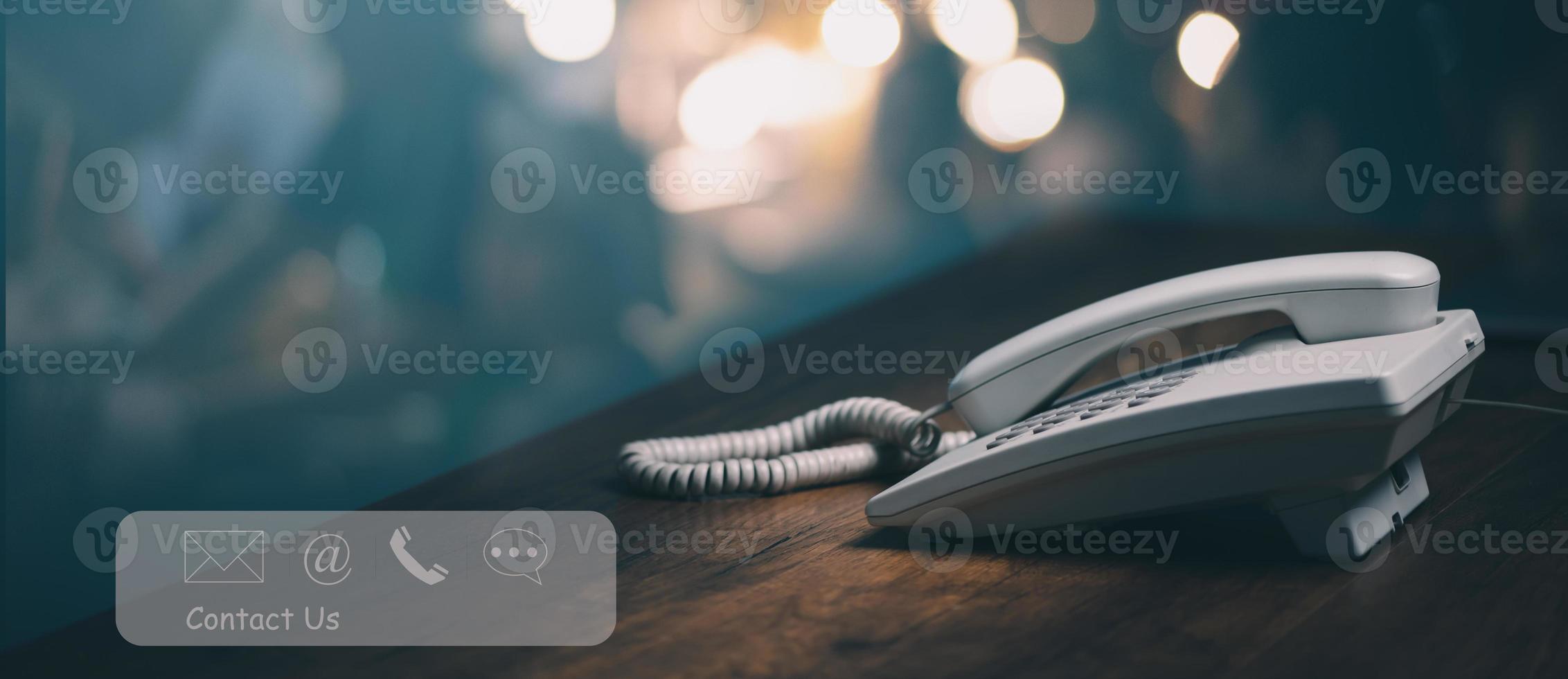 Communication contact us customer service,Telephone on the operator desk service center with message, phone, e mail, address icons, copy space. photo