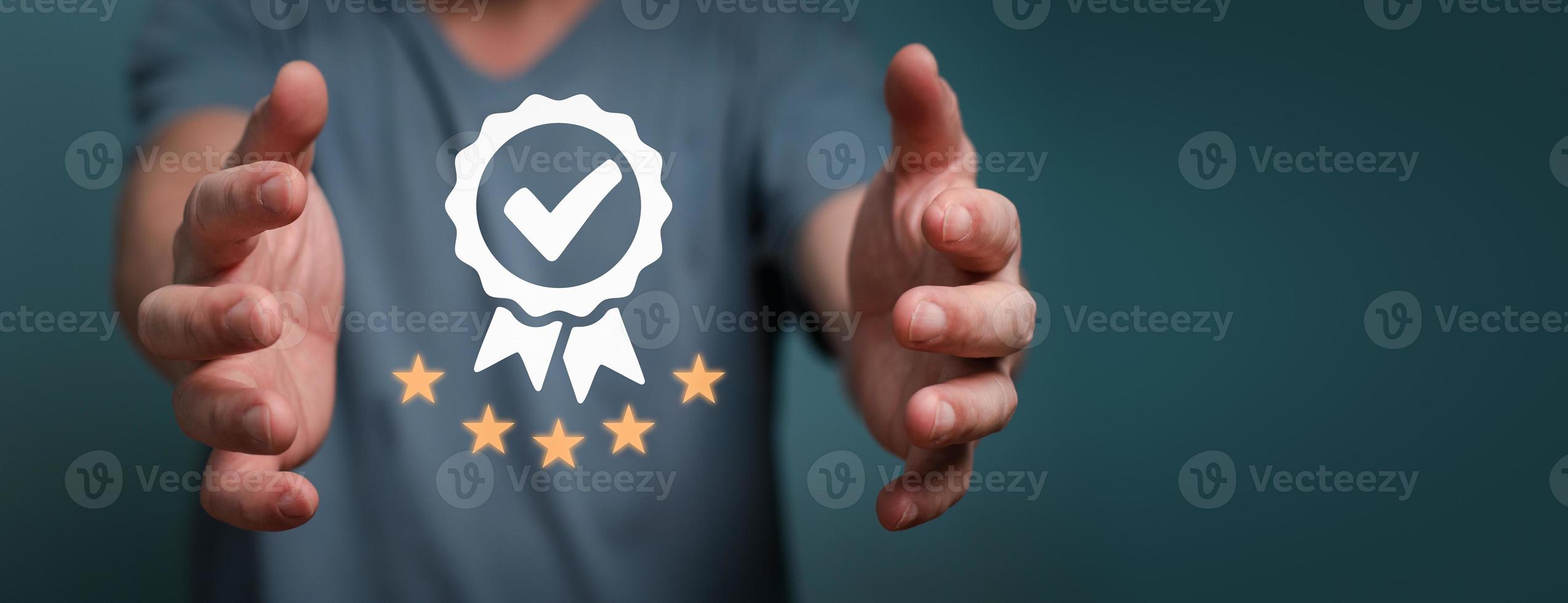 Businessman holding sign of the top service Quality assurance, Satisfaction Guarantee, Standards, ISO certification and standardization concept. photo
