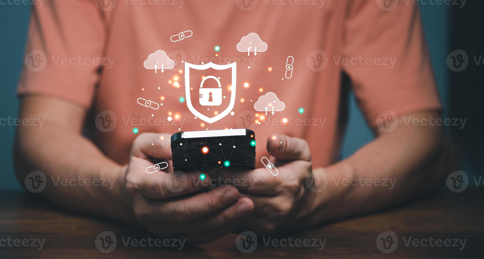 Cyber security connection shield technologies background, Human finger touching on mobile phone with global network linking technology. photo