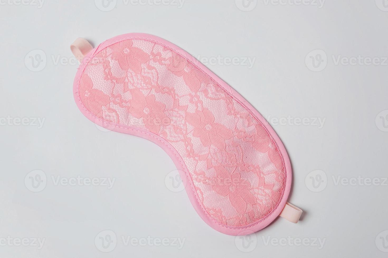 Sleeping eye mask, isolated on white background. Do not disturb me, let me sleep. Rest, good night, insomnia, relaxation, tired, travel concept. photo