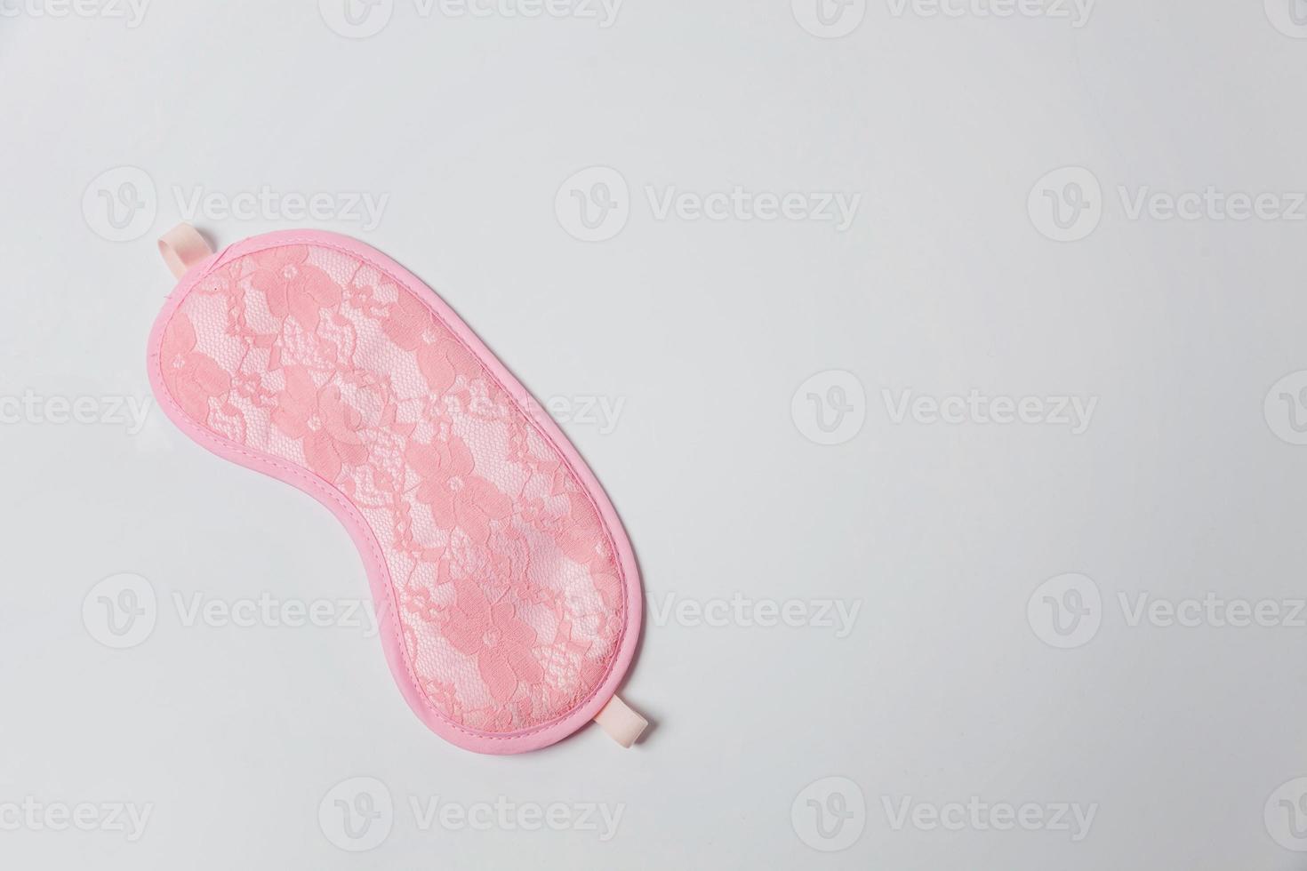 Sleeping eye mask, isolated on white background. Do not disturb me, let me sleep. Rest, good night, insomnia, relaxation, tired, travel concept. photo