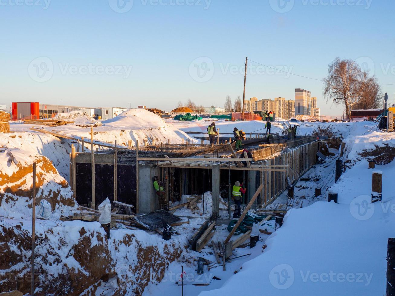 Building construction in winter.   technologies. photo