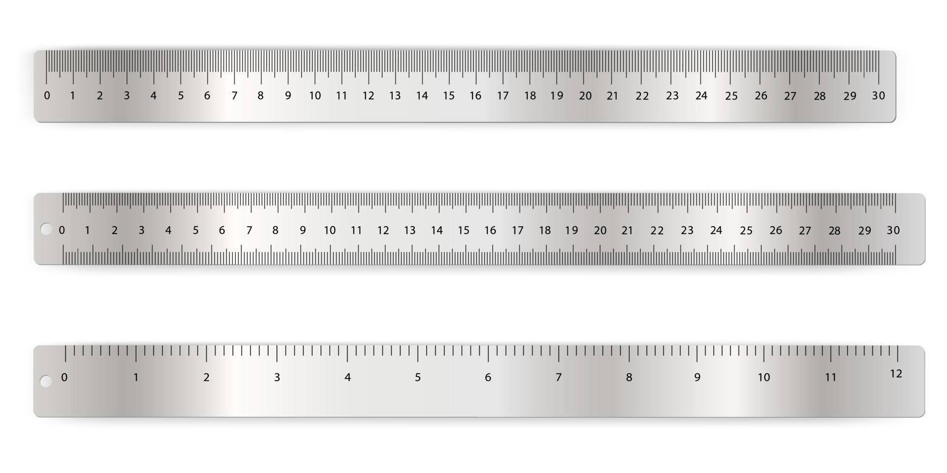 A set of metal rulers.Metric double ruler, metric single ruler, inch