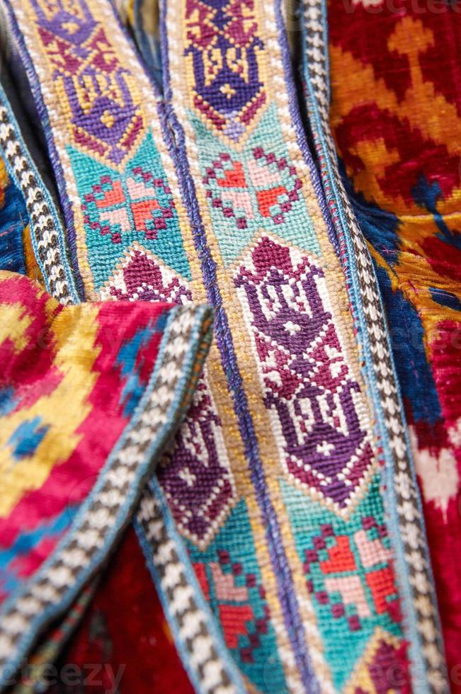 The decorative elements and ornaments on the national clothes of Uzbekistan photo