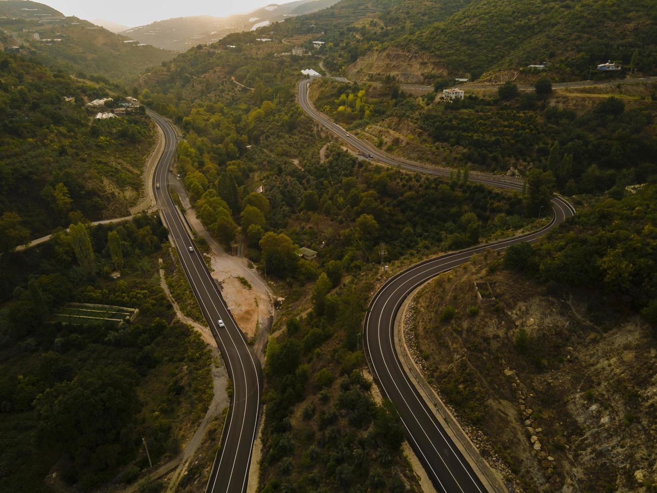 aerial valley and road, Top view, amazing nature background. sunset Flying drone, seascape photo