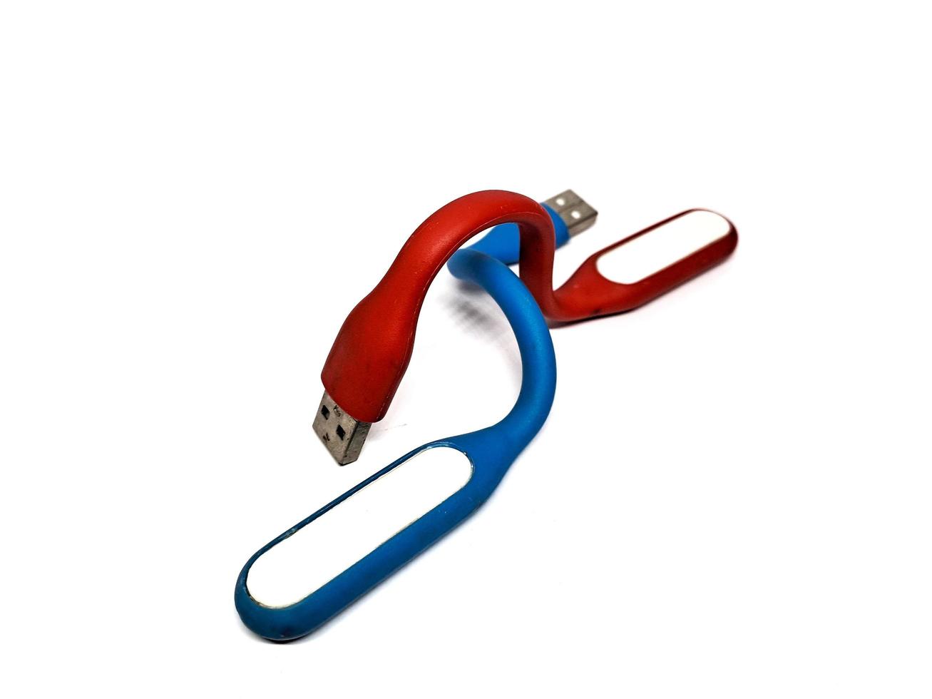 Red blue LED light, a stick that can be used as a power bank, white background photo