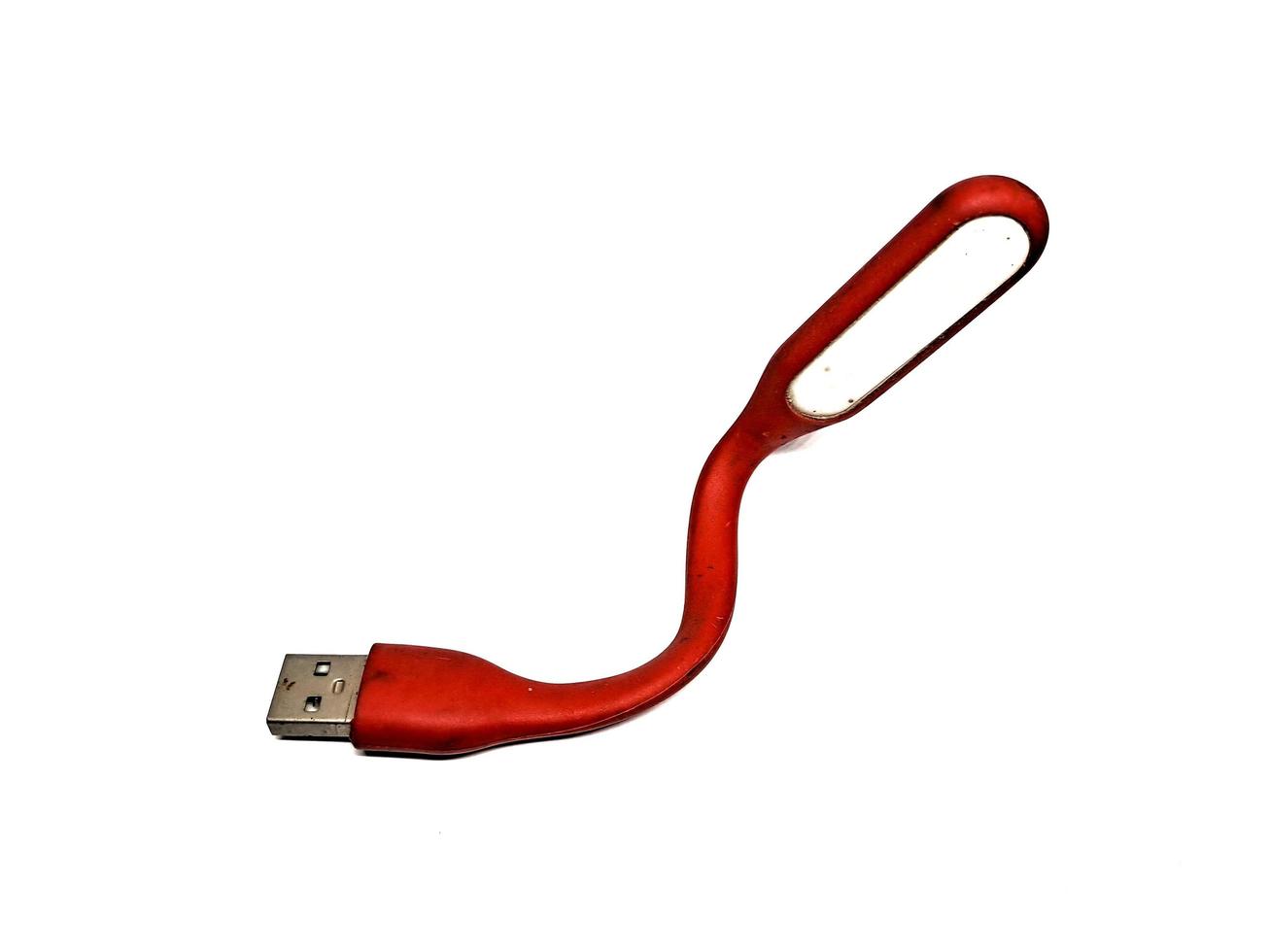 Red LED light stick that can be used as a power bank, white background photo