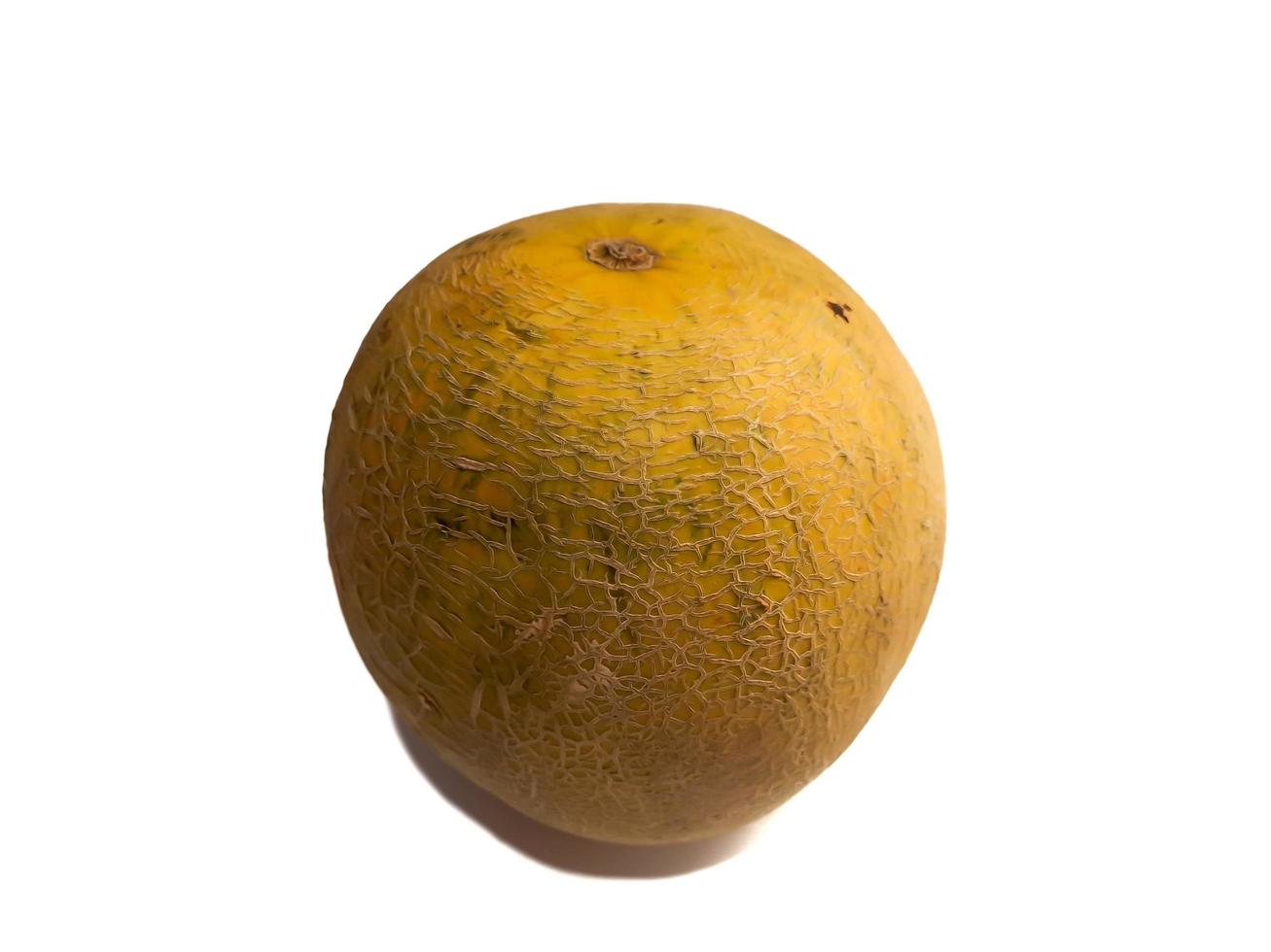 Fresh golden melon in fruit shop photo