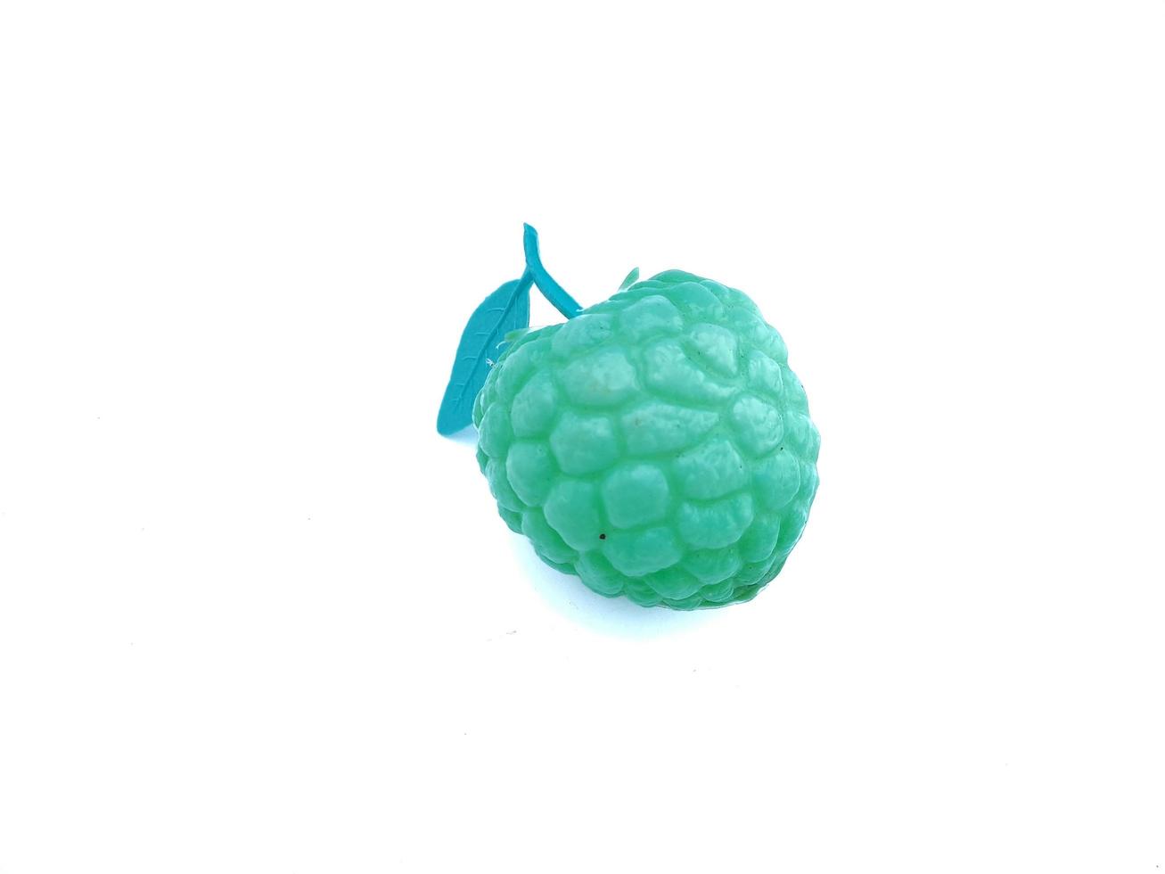Children's colorful fruit toys on a white background, perfect for children's intelligence education photo