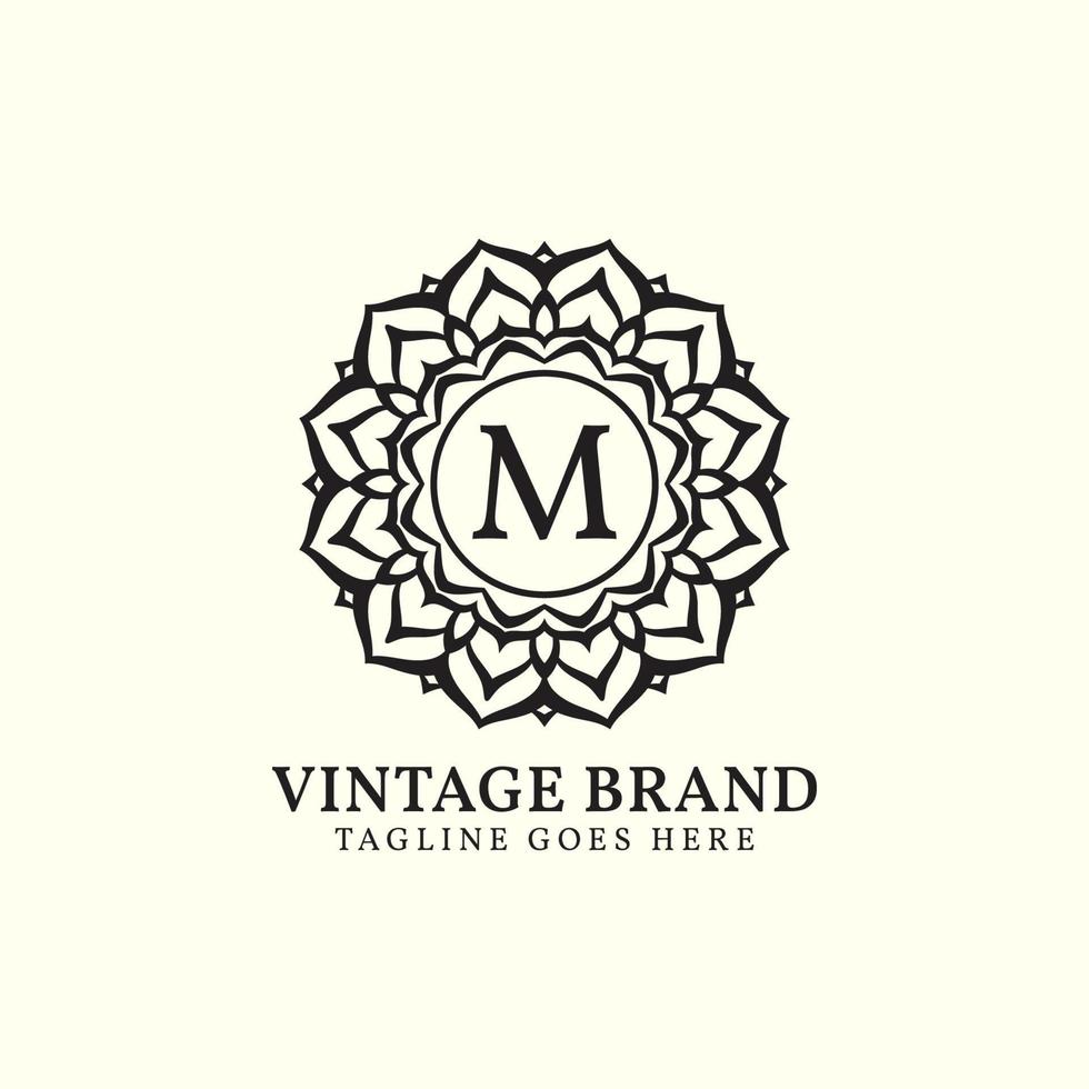 luxurious mandala vintage letter M vector logo design