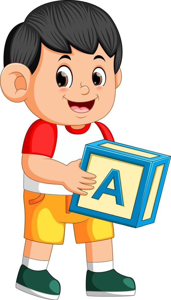 happy boy holding the alphabet cube vector