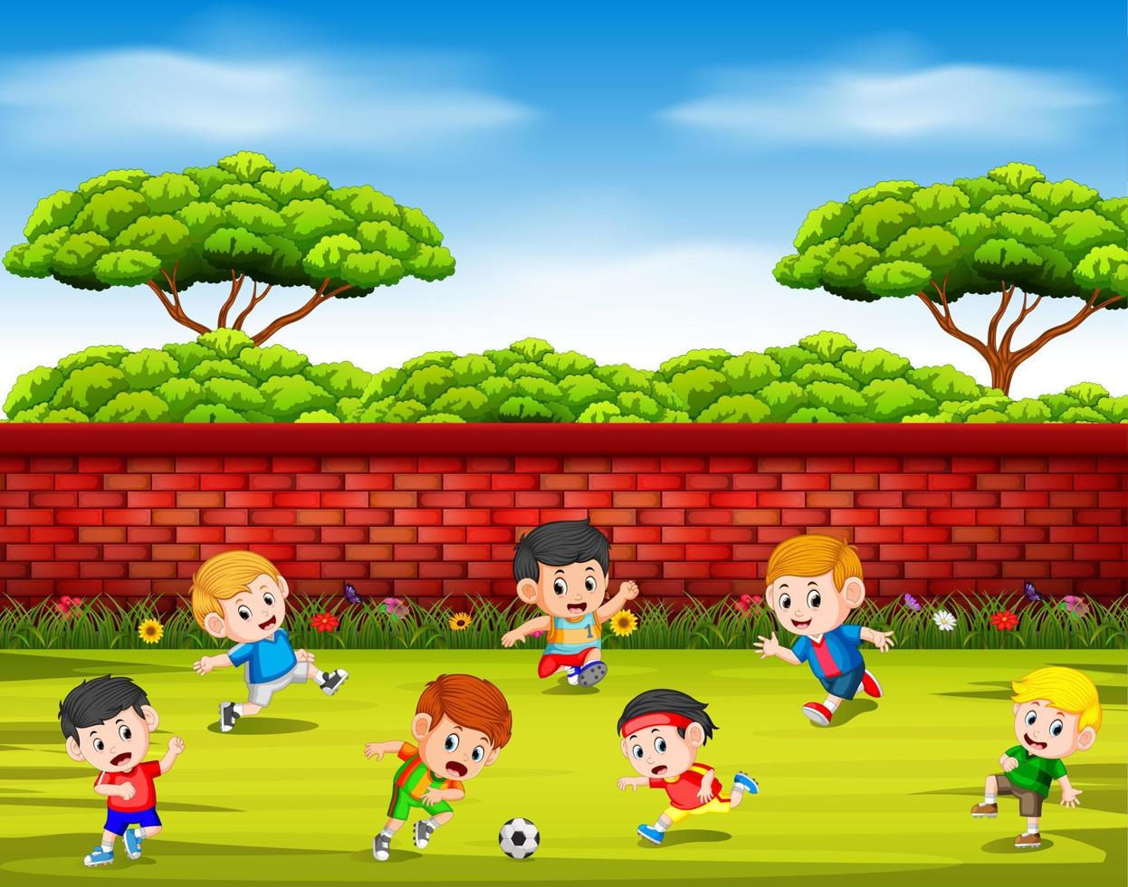 the children playing soccer with their team together in the yard vector