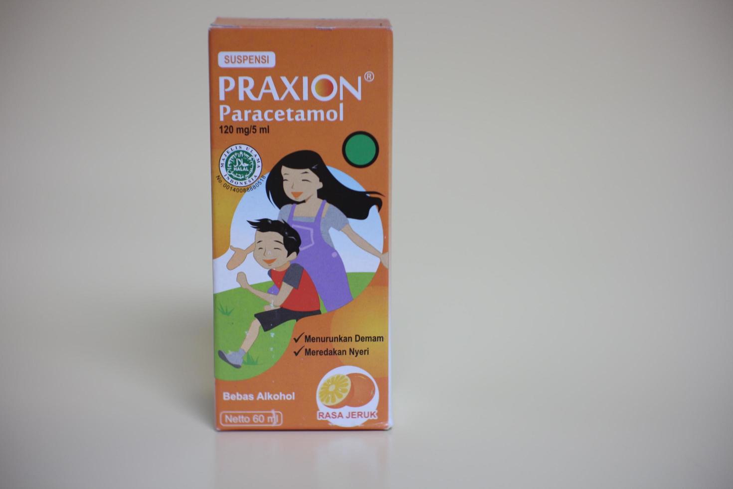 Magelang,Indonesia,2022-Plain background photo isolated with fever-reducing syrup used when a child has a fever.