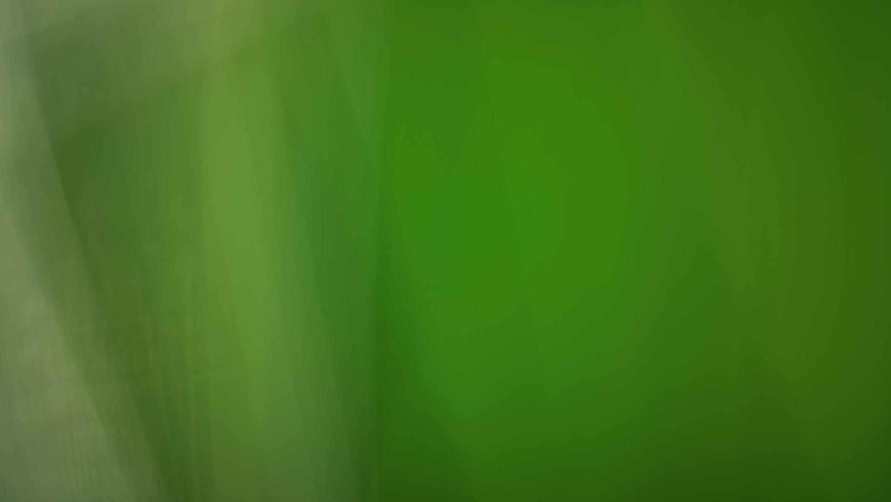 Imaginative blurred green shades, Blur green gradient abstract background. Computer wallpaper. photo