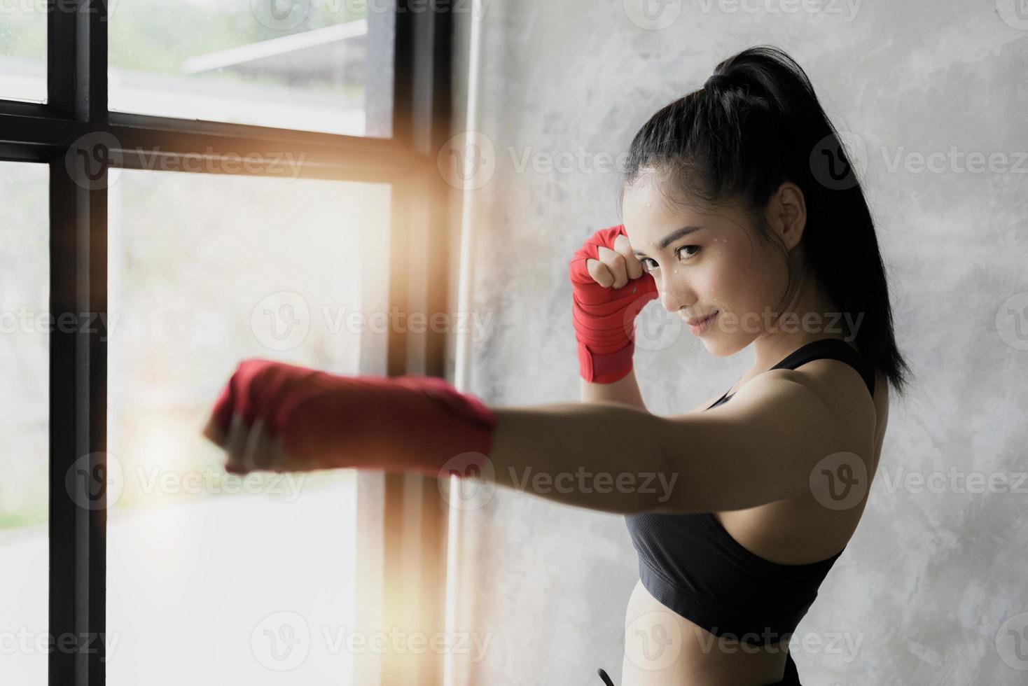 Young and beautiful female boxer photo