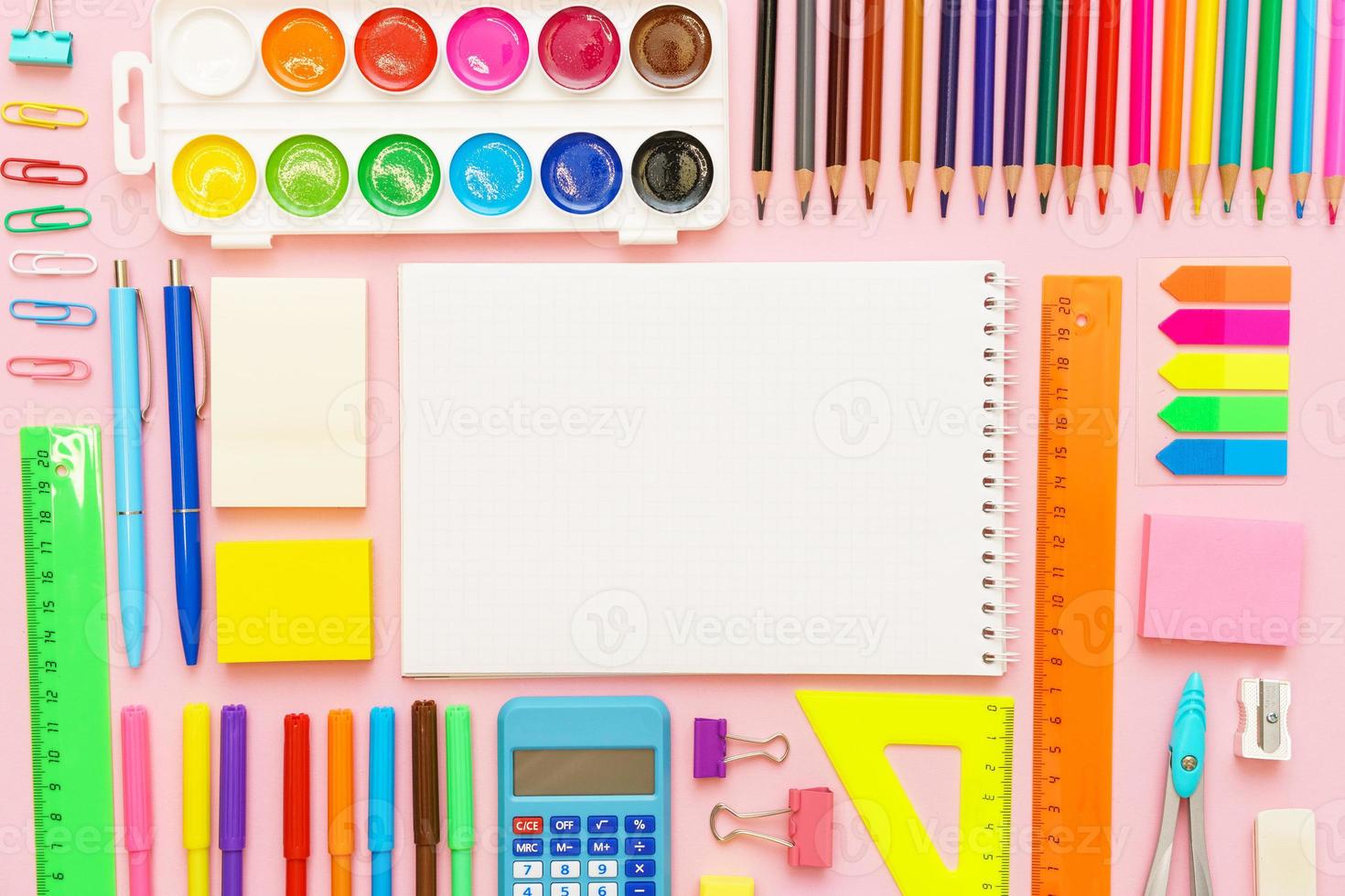 School note and landing on pink background. Back to school, home study creative photo