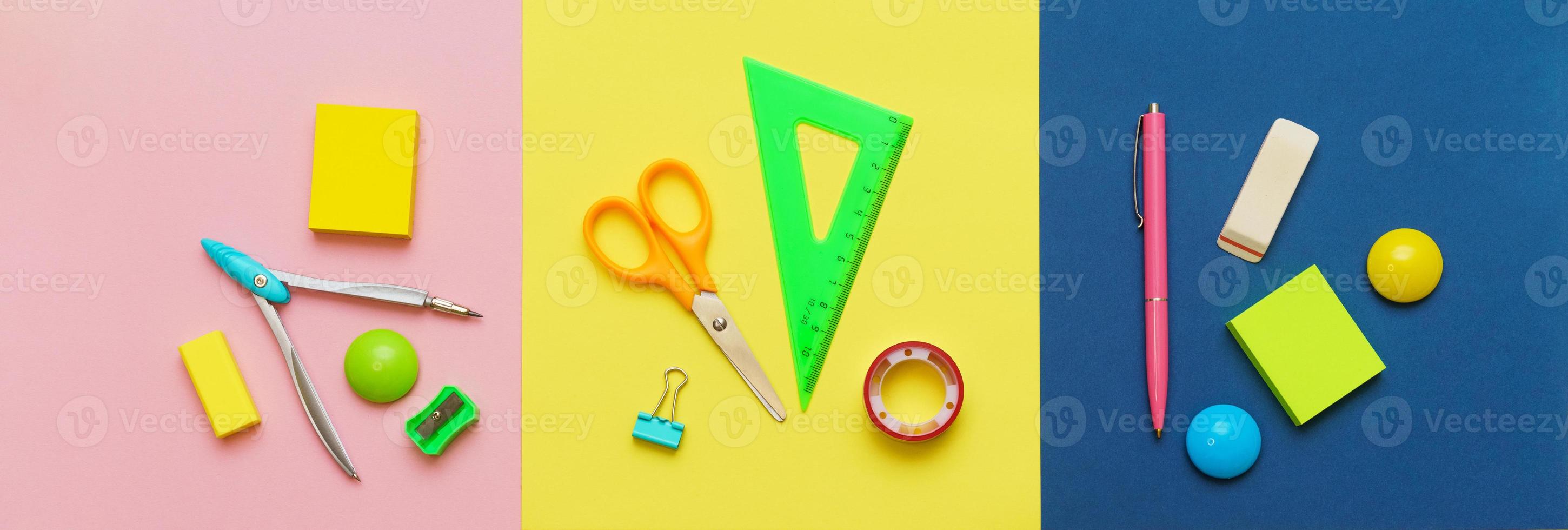 Various stationery for the school on a multicolored background. Back to school photo