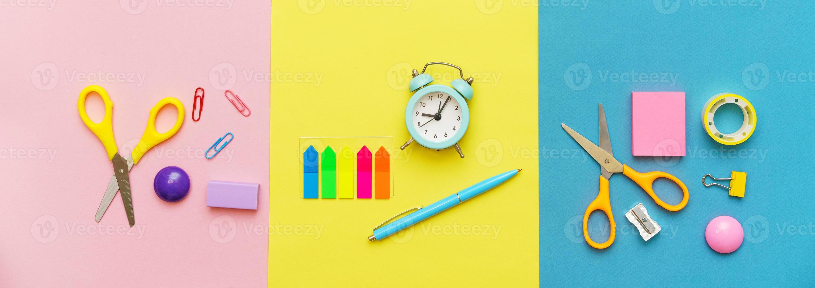 Various stationery for the school on a multi-colored background. Back to school photo