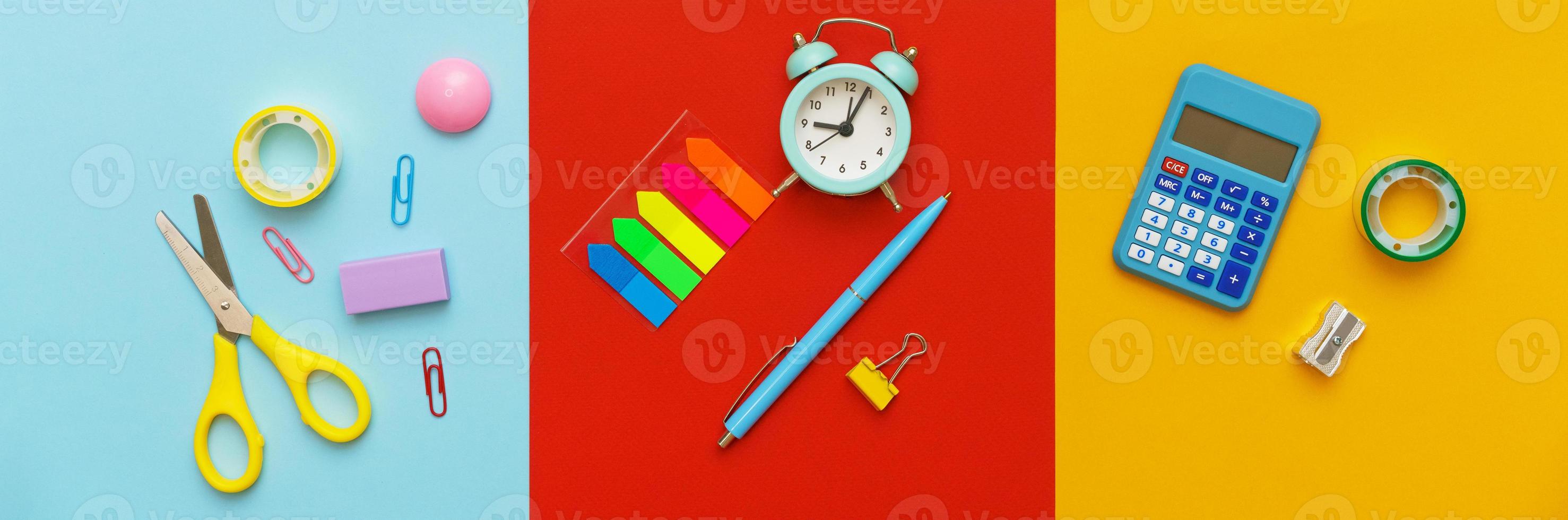 Various stationery for the school on a multi-colored background. Back to school photo