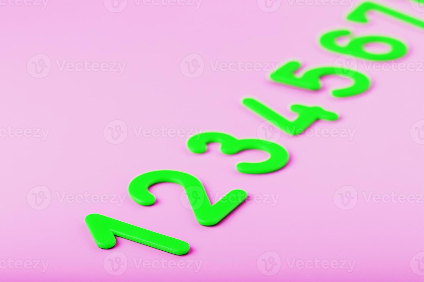 Numbers from 1 to 10 in a row for children on a pink background. photo