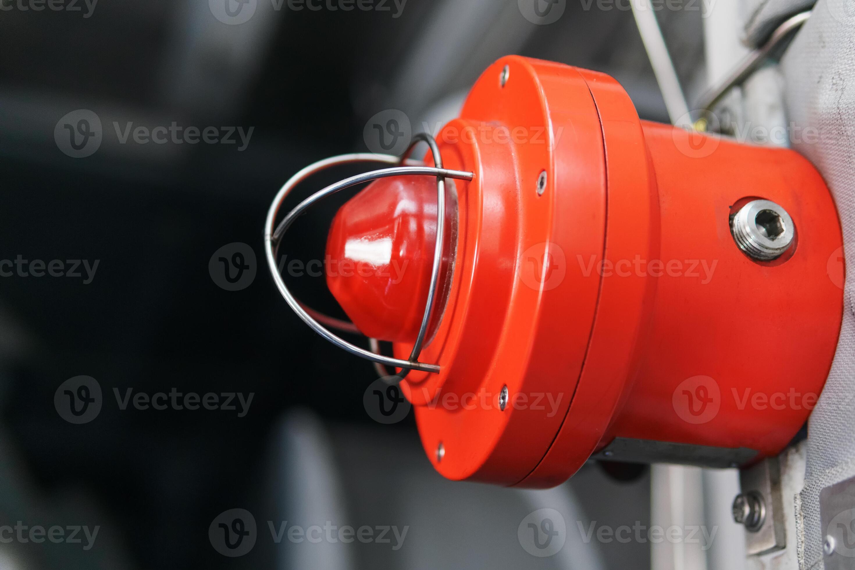 Red warning light of an emergency beacon at an industrial facility