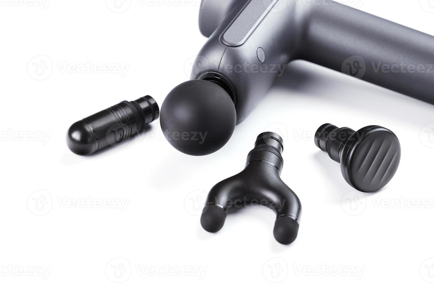 Body massager with various attachments on a white background. photo