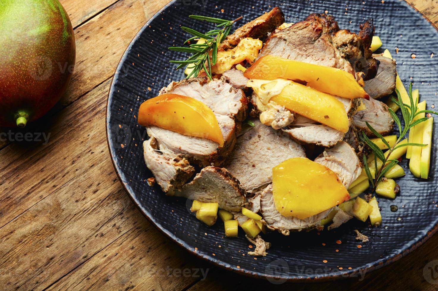 Baked meat with mango photo