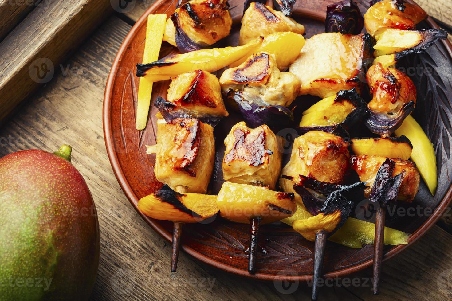 Chicken breast kebab with mango photo