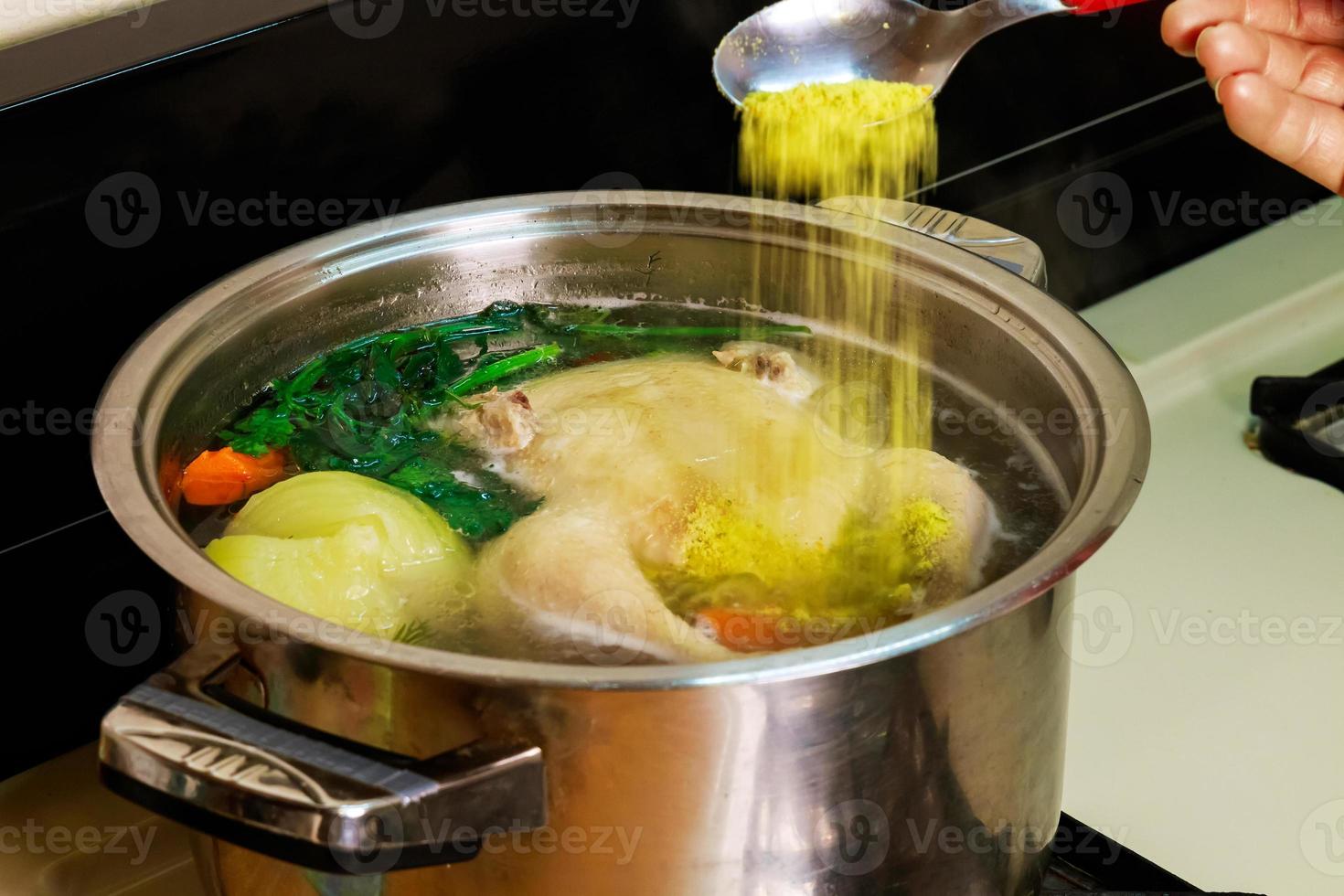 Chicken soup in a bowl with crackers. photo