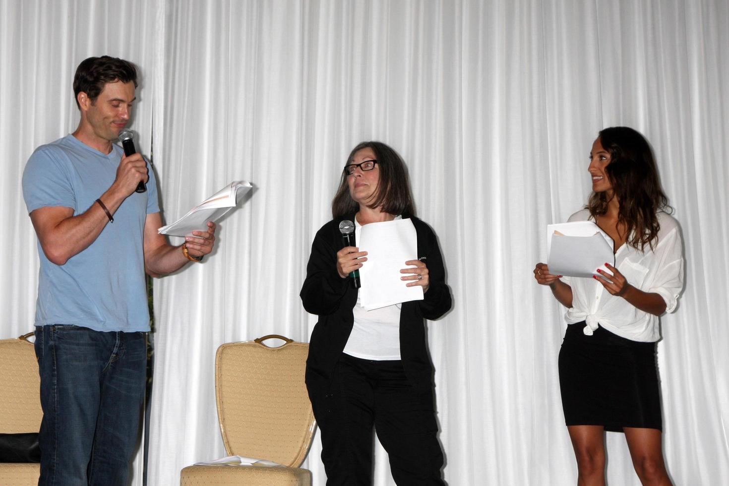 LOS ANGELES, AUG 25 - Daniel Goddard, Fan, Christel Khalil doing a scene from a YnR script at the Goddard and Khalil Fan Event at the Universal Sheraton Hotel on August 25, 2013 in Los Angeles, CA photo