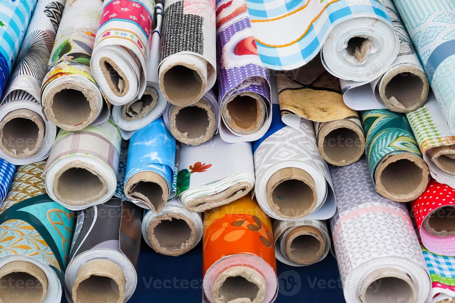 Samples of cloth and fabrics in different colors found at a fabrics market photo