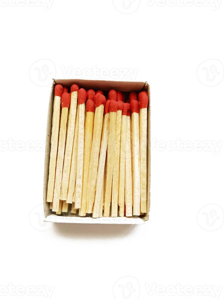 Matches in a box on white background photo