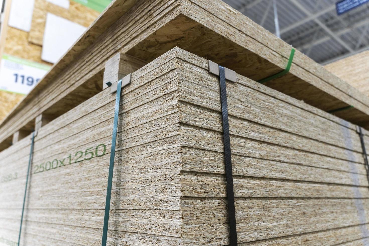 a stack of chipboard in a hardware store. wooden usb sheet. photo