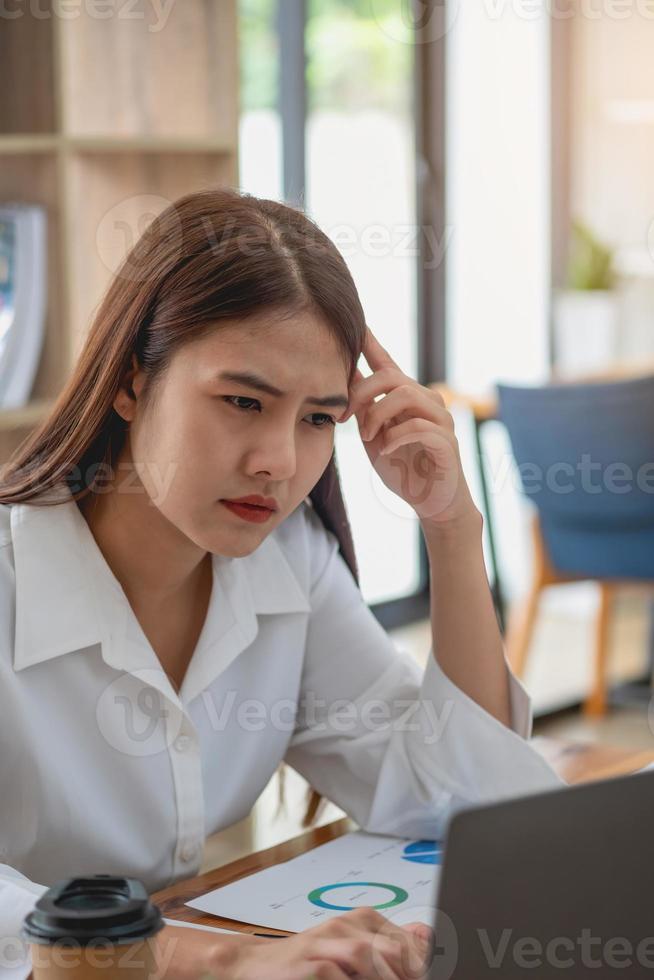 Concept Burnout Syndrome. Business Woman feels uncomfortable working. Which is caused by stress, accumulated from unsuccessful work And less resting body. Consult a specialist psychiatrist. photo