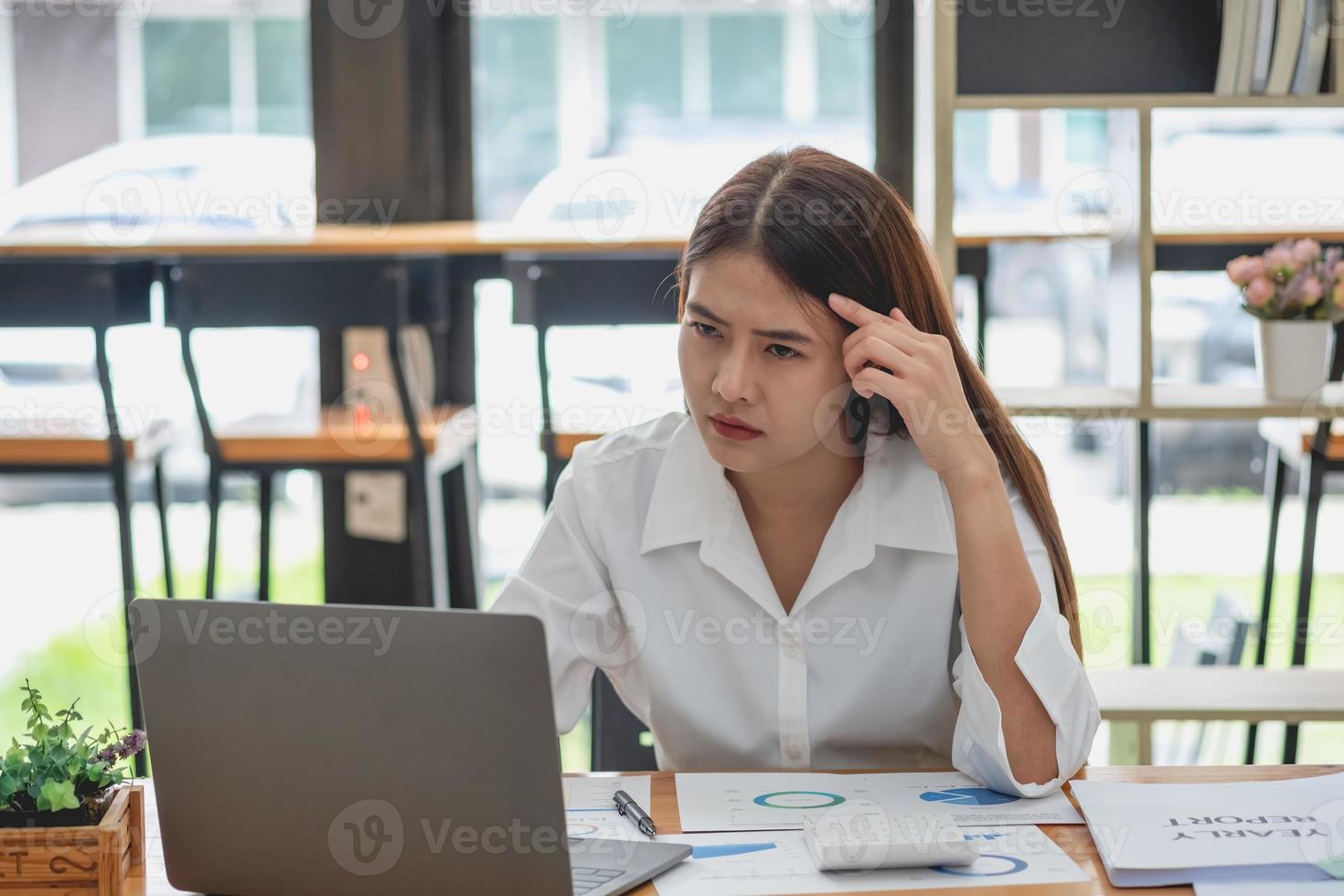 Concept Burnout Syndrome. Business Woman feels uncomfortable working. Which is caused by stress, accumulated from unsuccessful work And less resting body. Consult a specialist psychiatrist. photo