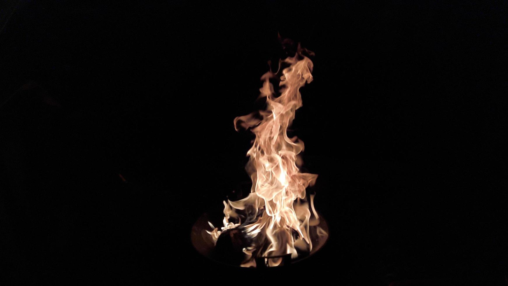 Burning fire on black background and landscape mode 11 photo