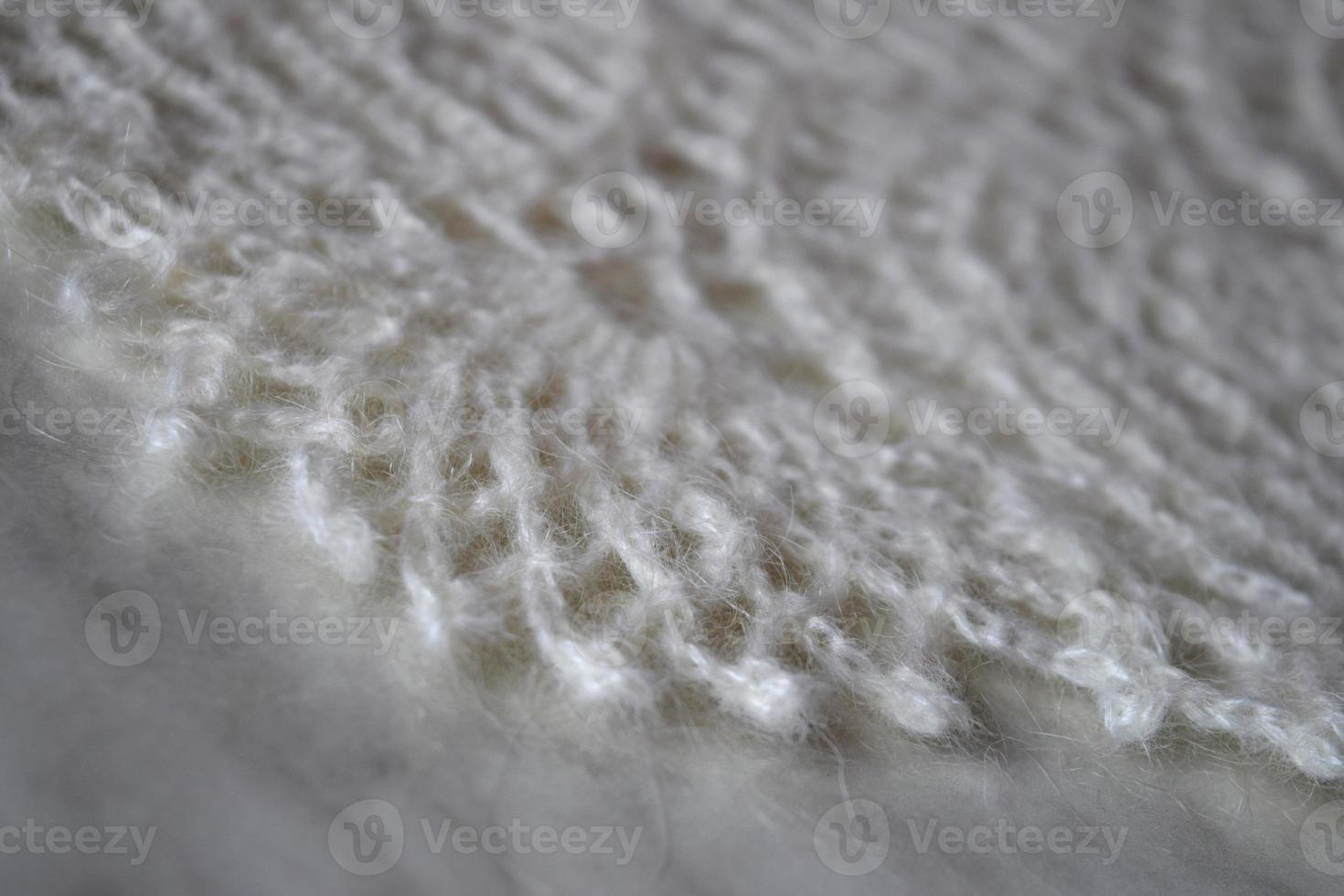 White knitted shawl close-up. Orenburg downy shawl photo