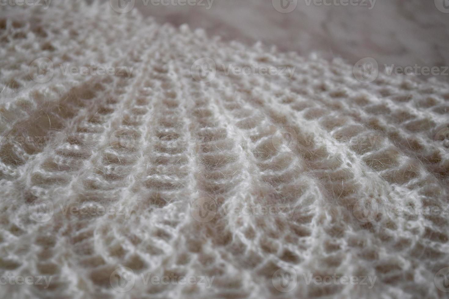 White knitted shawl close-up. Orenburg downy shawl photo