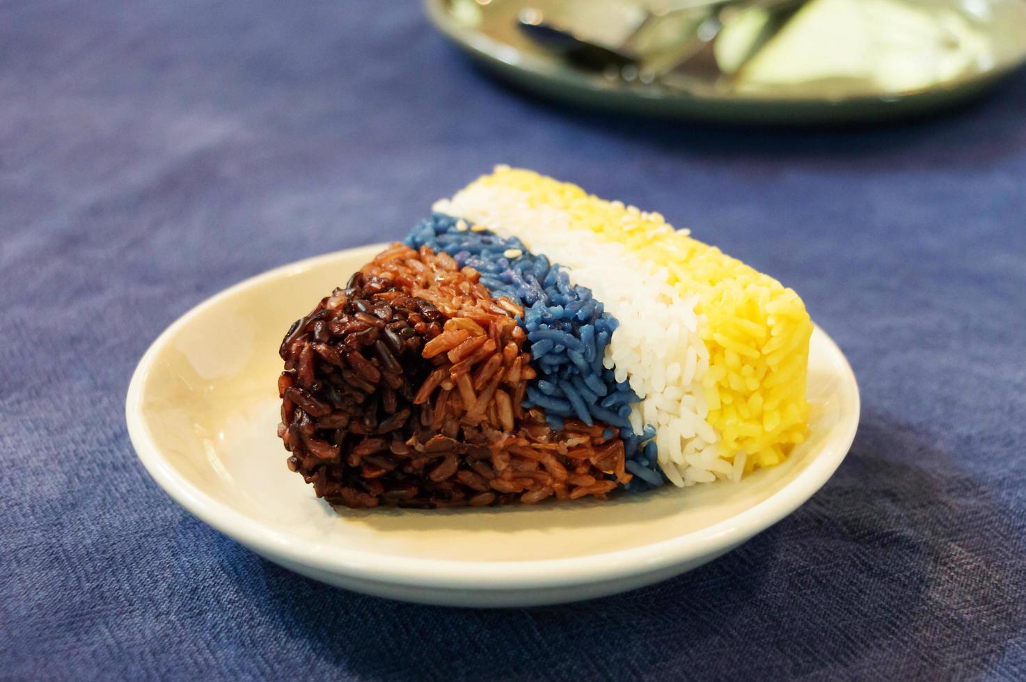 colorful steam rice berry on plate photo